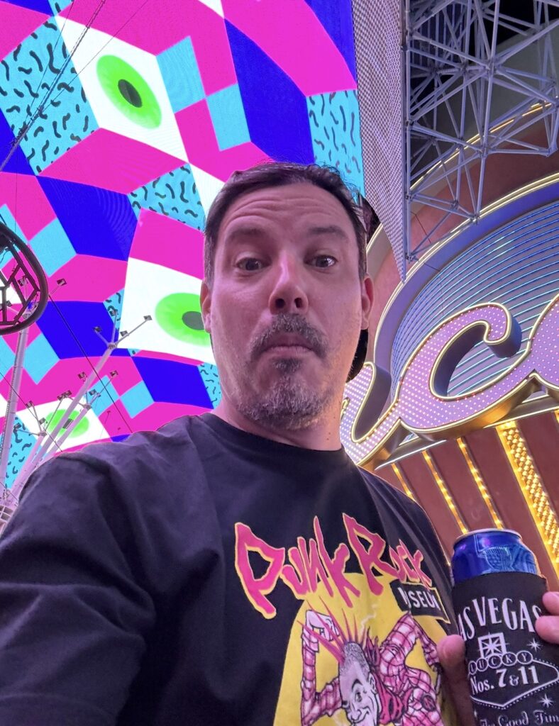 Double Down Mac enjoying a beer while exploring Fremont Street in downtown Las Vegas.