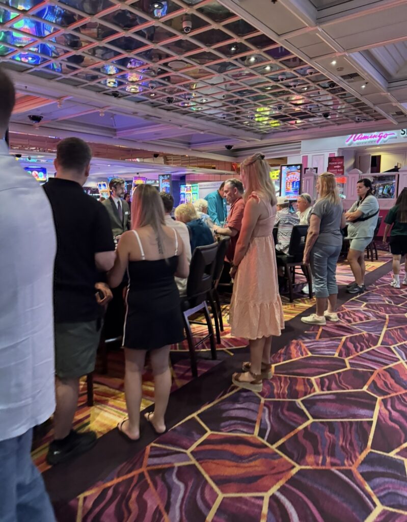 Busy table games area inside the Flamingo Las Vegas casino