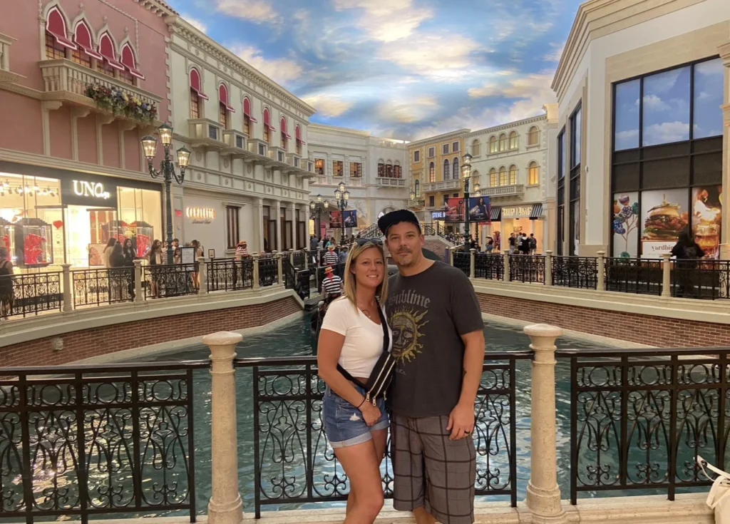 Double Down Mac and Nikki posing along the indoor canals at The Venetian Resort in Las Vegas, Nevada.