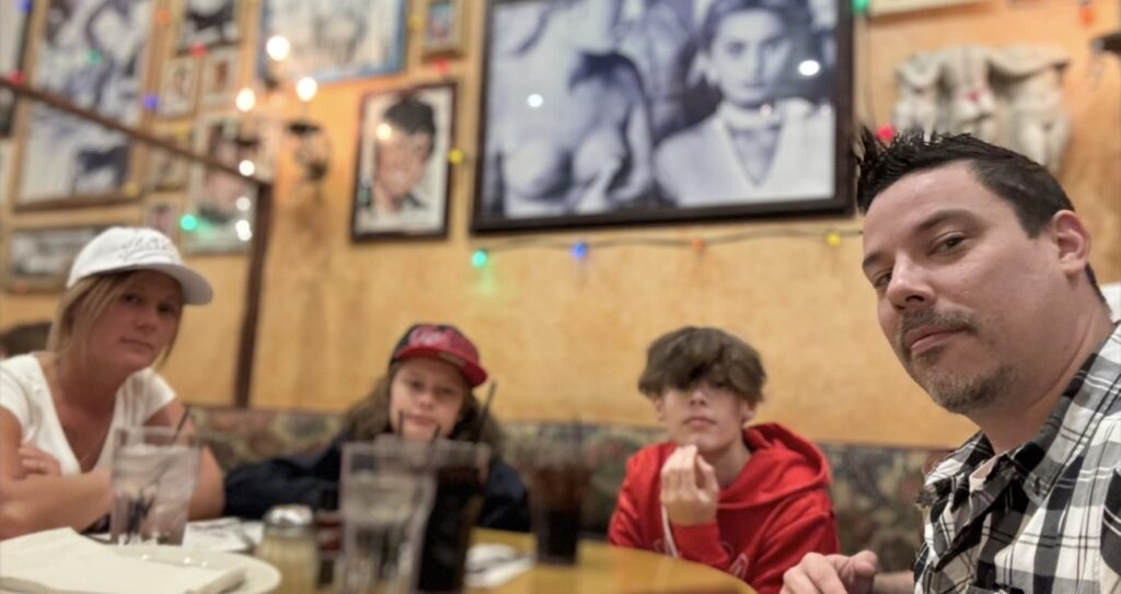 Family having dinner at Buca di Beppo inside Excalibur Las Vegas