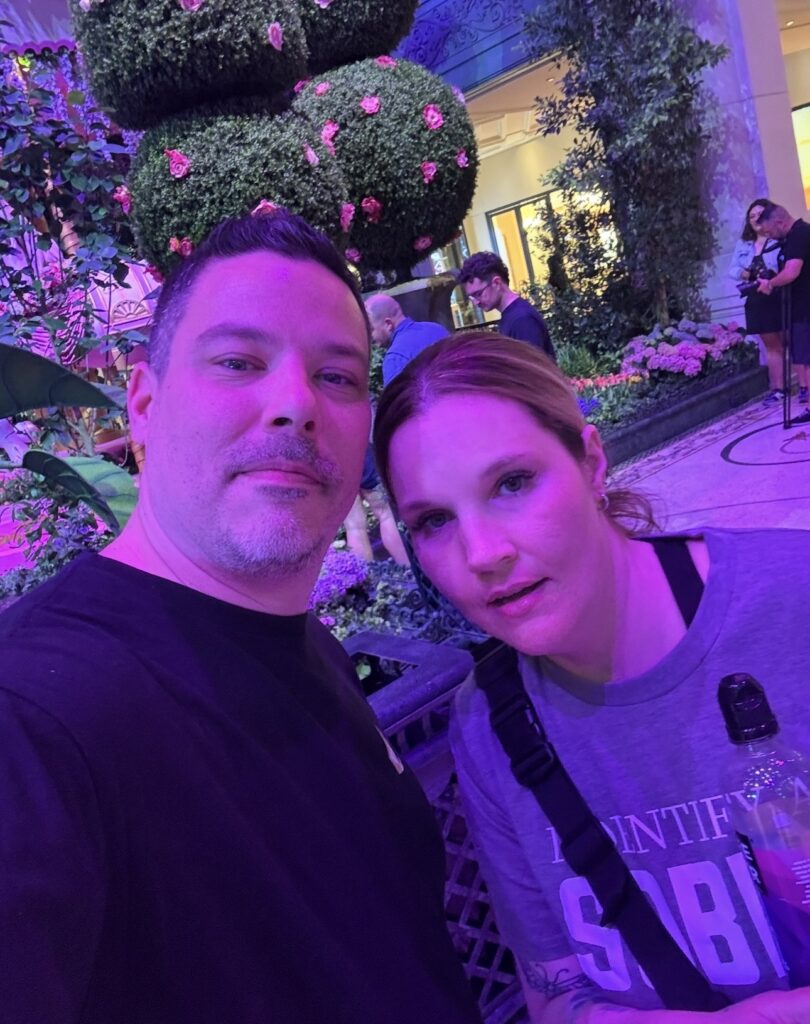 Double Down Mac and his sister Sam taking a selfie inside the Bellagio Conservatory in Las Vegas