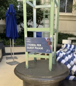 One towel per guest sign at the Paris Las Vegas pool