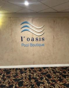 L’Oasis Pool Boutique sign inside Paris Las Vegas