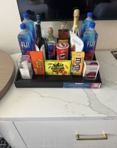 Mini bar with drinks and snacks inside a Paris Las Vegas room
