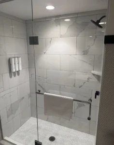 Glass walk-in shower in a Versailles Tower room at Paris Las Vegas