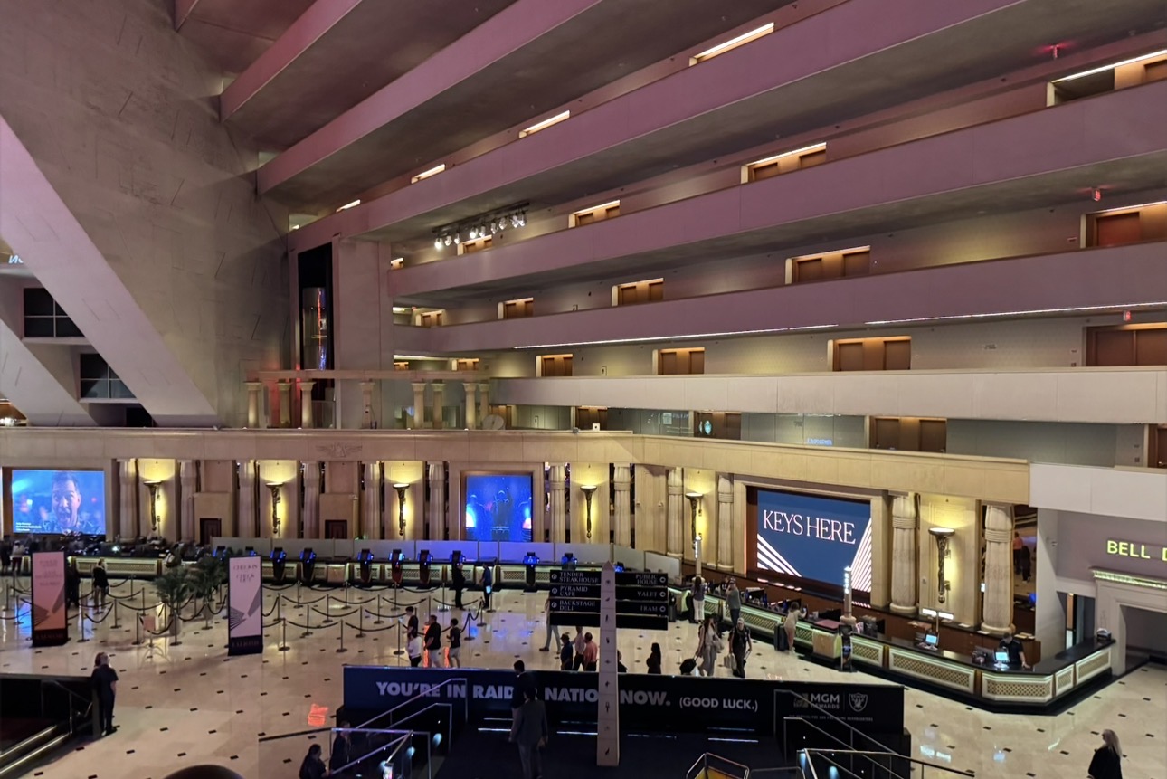 Hotel check-in desk inside Luxor Las Vegas beneath the pyramid atrium